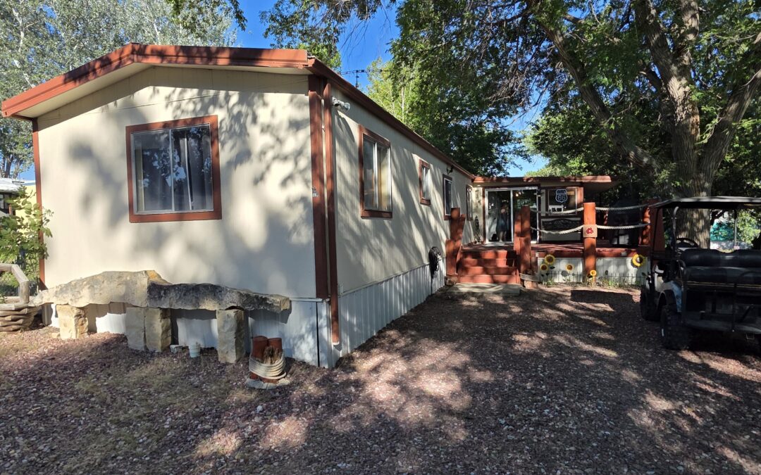 Lake living starts here! Relax on wraparound deck!